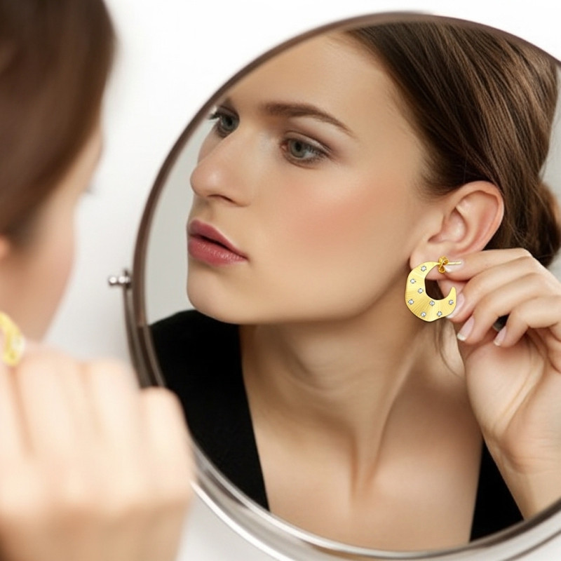 Pendientes-plata-acabado-oro-imagen-modelo-Enigma-plata