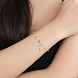 Pulsera-plata-bolitas-y-cruz-imagen-modelo-Enigma-plata