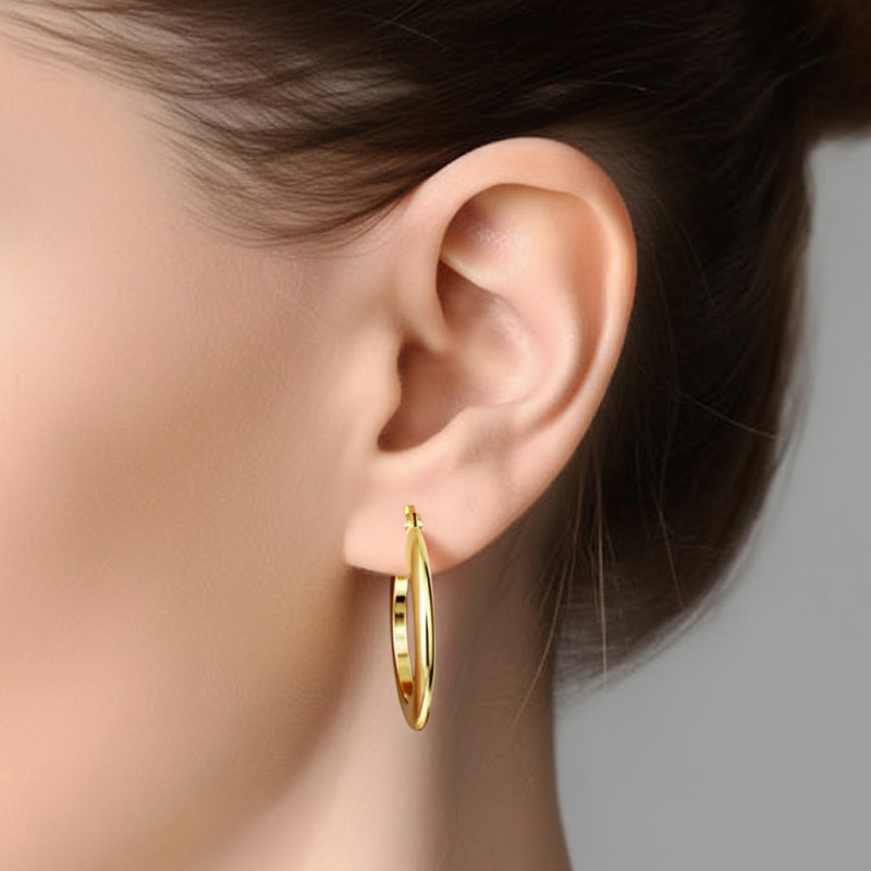 Pendiente-aro-plata-acabado-oro-imagen-modelo-Enigma-plata