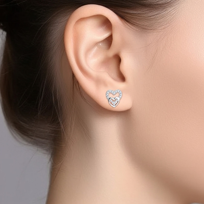 Pendientes-plata-doble-corazón-imagen-modelo-Enigma- Plata