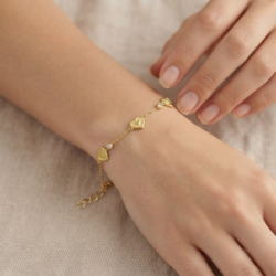 Pulsera-plata-acabada-oro-corazones-imagen-modelo-Enigma-plata